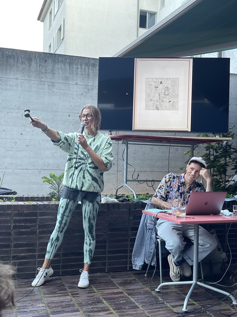 Electric Art Collective in action (Sandra Nedvetskaia and Peter Hauser), Zurich Art Auction 2021, Restaurant Blau, Zurich