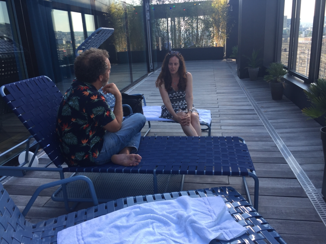 Rich Bott in a meeting with Marcy Goldberg on the hotel terrasse